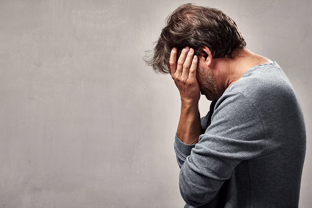 man struggling with mental health issues